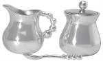 Pearled Creamer, Sugar and Spoon Set A gift for tradition, re-imagined, in the String of Pearls collection. Perfect for serving coffee or tea. A wealth of luxurious pearls and elegant contours form the creamer, sugar bowl, and spoon in this brilliant serveware set.